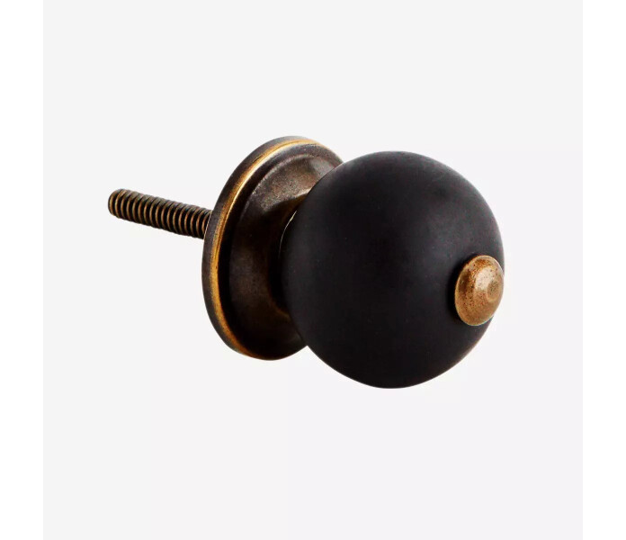 madam stoltz musta nuppi knopp svart kuva