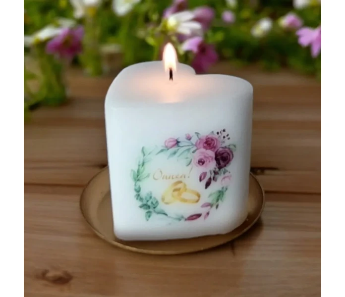 puttipaja sydankynttila onnittelukynttila sormukset haaparille kihlaparille kuva